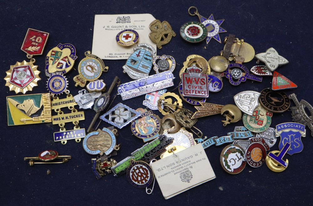 A collection of vintage badges